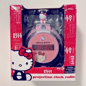 Brand new, hello kitty, adjustable projection radio clock, very cute!